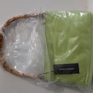 Sondra Robert's green sequin purse handbag